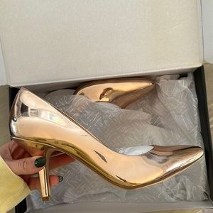 Rose gold pumps